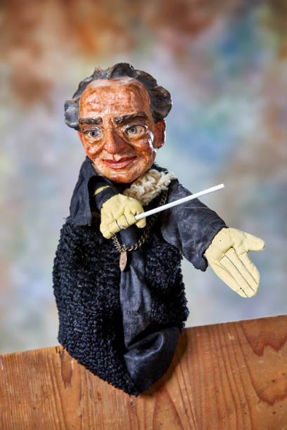 istock Vintage hand puppet from the 1930s, the conductor 1349356094