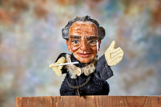 istock Vintage hand puppet from the 1930s, the conductor 1349356360