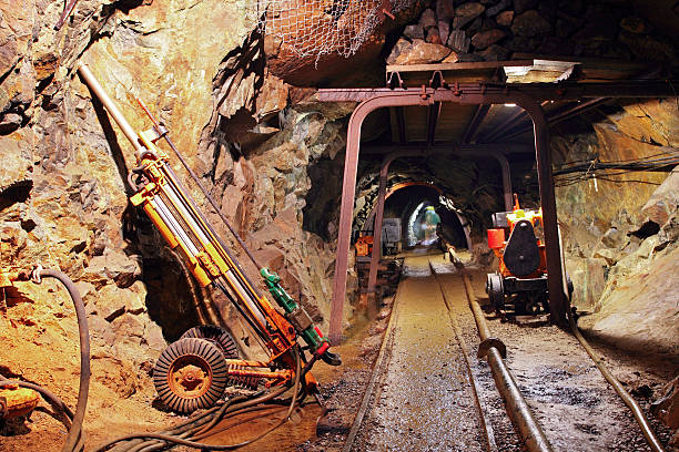 istock Tunnel with carts in gold silver and copper mine 134935714