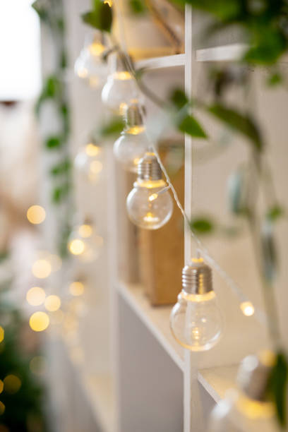 istock Christmas lights garlands for Christmas tree decoration.Artificial spruce with decorative toys. Concept - Christmas weekend 1349357580