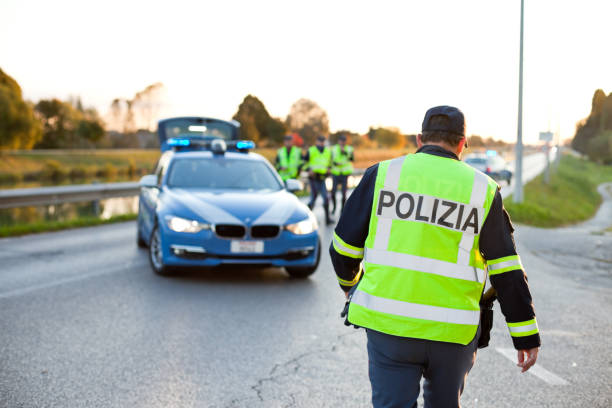 Italian Police attend a road traffic accident stock photo