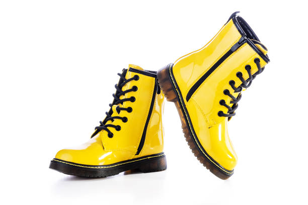 Shiny leather shoes. Shining boots isolated.