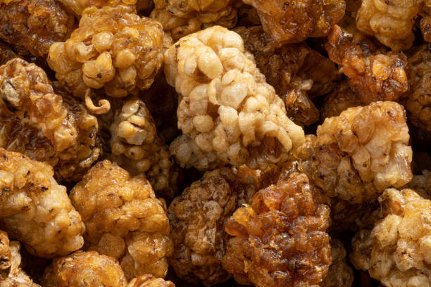 Detailed and large close up shot of dried mulberries.