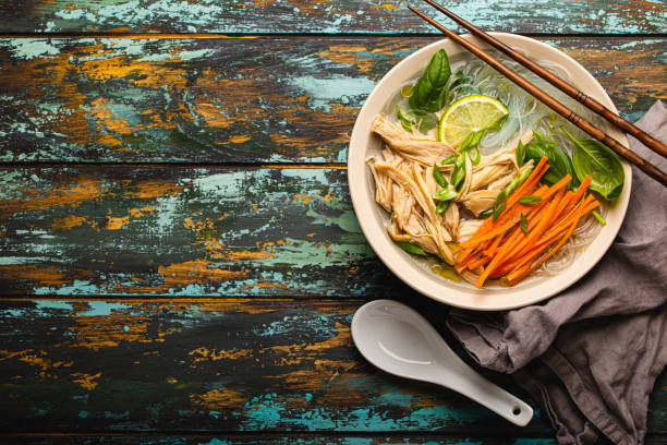 istock Asian soup with noodles in bowl top view copy space 1349371804