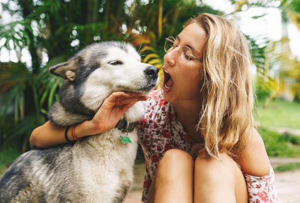 istock Young Woman With Her Dog 1349371894
