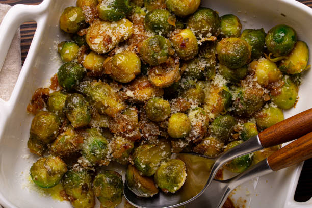 istock Vegetarian roasted brussels sprouts on wooden table 1349372102