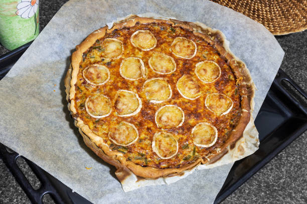 istock Vegetable quiche with bacon decorated with goat cheese 1349372623