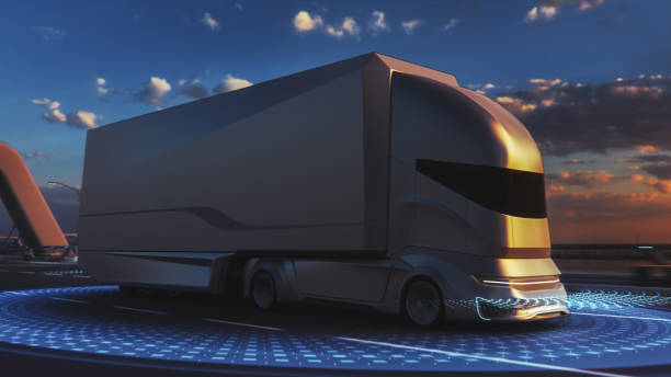 istock Futuristic Technology Concept: Autonomous Self-Driving Lorry Truck with Cargo Trailer Drives on the Road with Scanning Sensors. Special Effects of a Vehicle Analyzing Highway on a Sunset Evening. 1349375154