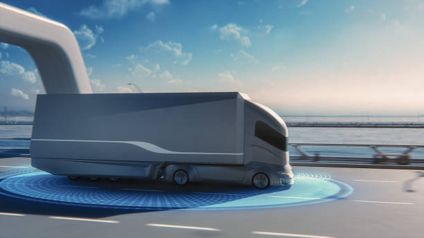 istock Futuristic Technology Concept: Autonomous Self-Driving Lorry Truck with Cargo Trailer Drives on the Road with Scanning Sensors. Special Effects of a Zero-Emissions Electric Vehicle Analyzing Freeway. 1349375158