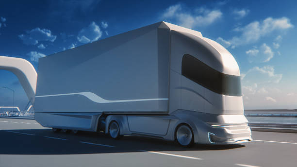 istock Futuristic Technology Concept: Autonomous Self-Driving Truck with Cargo Trailer Drives on the Road with Scanning Sensors. 3D Zero-Emissions Electric Lorry Driving Fast on Scenic Highway Bridge. 1349375182