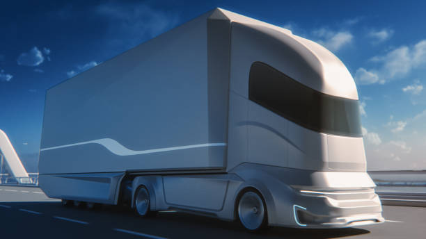 istock Futuristic Technology Concept: Autonomous Self-Driving Truck with Cargo Trailer Drives on the Road with Scanning Sensors. 3D Zero-Emissions Electric Lorry Driving Fast on Scenic Highway Bridge. 1349375190