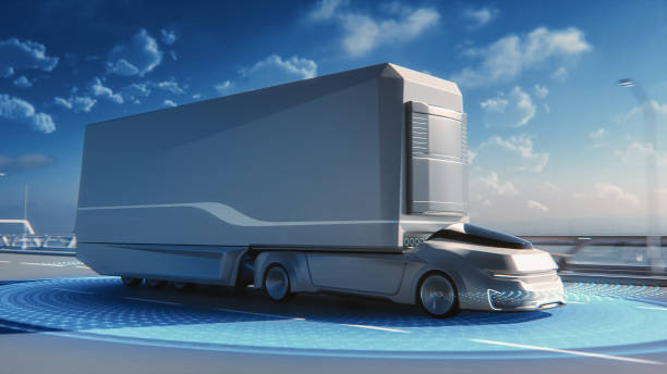 istock Futuristic Technology Concept: Autonomous Self-Driving Lorry Truck with Cargo Trailer Drives on the Road with Scanning Sensors. Special Effects of a Zero-Emissions Electric Vehicle Analyzing Freeway. 1349375197