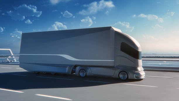 istock Futuristic Technology Concept: Autonomous Self-Driving Truck with Cargo Trailer Drives on the Road with Scanning Sensors. 3D Zero-Emissions Electric Lorry Driving Fast on Scenic Highway Bridge. 1349375208