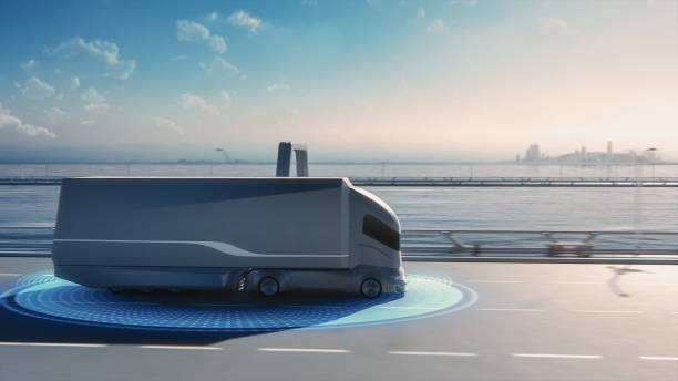 Futuristic Technology Concept: Autonomous Self-Driving Lorry Truck with Cargo Trailer Drives on the Road with Scanning Sensors. Special Effects of a Zero-Emissions Electric Vehicle Analyzing Freeway. Futuristic Technology Concept: Autonomous Self-Driving Lorry Truck with Cargo Trailer Drives on the Road with Scanning Sensors. Special Effects of a Zero-Emissions Electric Vehicle Analyzing Freeway. autopilot stock pictures, royalty-free photos & images