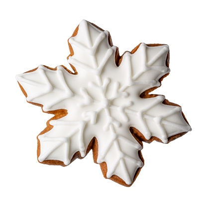 Christmas gingerbread cookie snowflake isolated on white background.