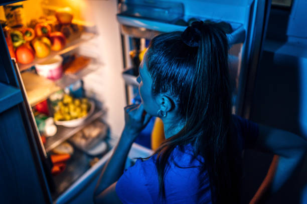 istock Woman thinking about what to eat 1349379064
