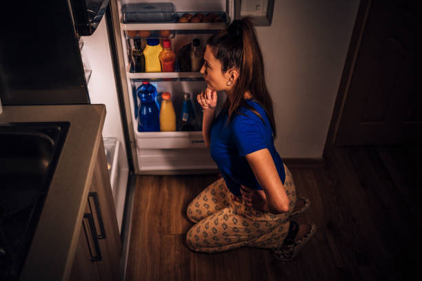 istock Woman thinking about what to eat 1349379161