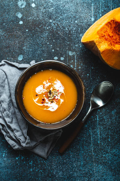 istock Pumpkin cream soup top view 1349381970