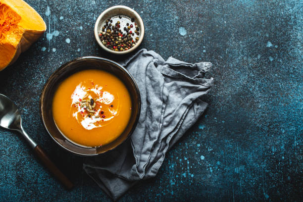 istock Pumpkin soup in bowl copy space 1349381975