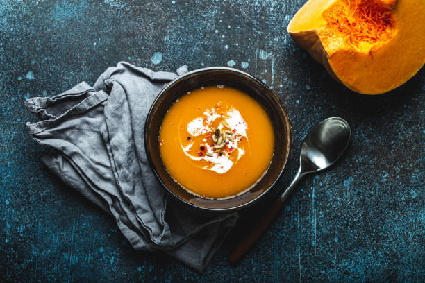 istock Pumpkin cream soup top view 1349381990