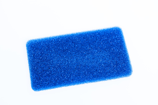 Blue sponge isolated on white background clipping path