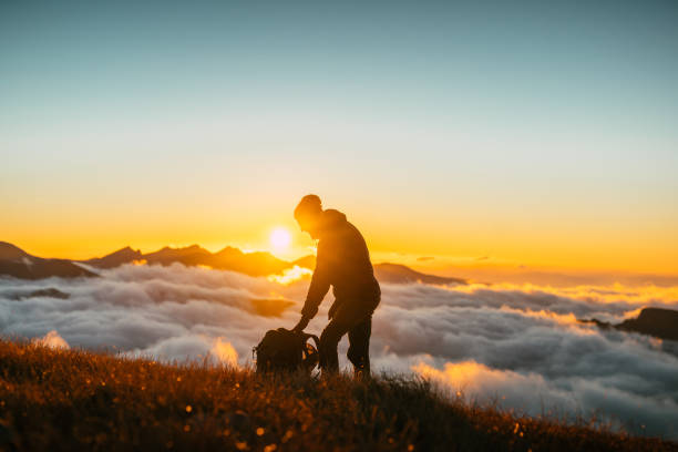 istock Autumnal landscape with Tatra mountains and sunlight. Clouds floating above peaks 1349383068