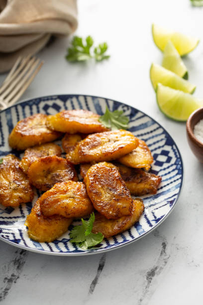 istock Fried caramelized plantains served with lime wedges 1349383609