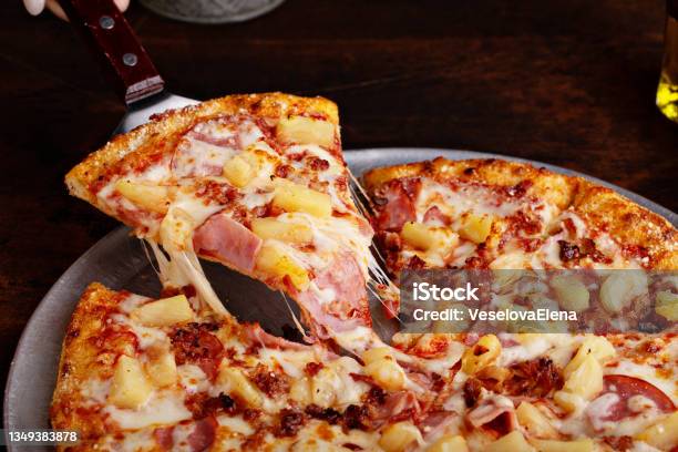Hawaiian Pizza With Ham And Pineapple Stock Photo - Download Image Now - Pizza, Hawaiian Pizza, Pineapple