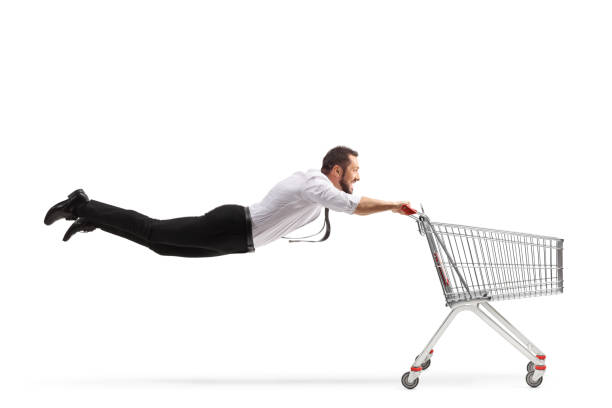 istock Man flying with an empty shopping cart 1349384440