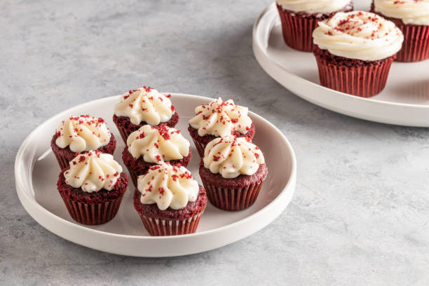 istock mini red velvet cupcakes in a white dish on a light background 1349384587