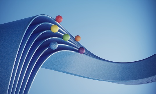 Multi colored balls riding on the blue wavy ribbons on blue background, can be used in balance, career growth, money improvement, variation etc. concepts. (3d render)