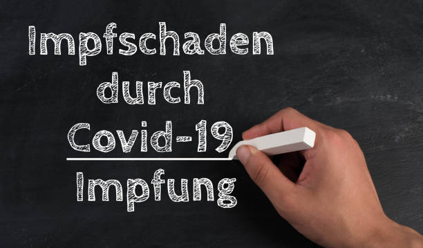 istock Vaccine damage through Covid-19 vaccination, german language, chalkboard, pandemic 1349386500