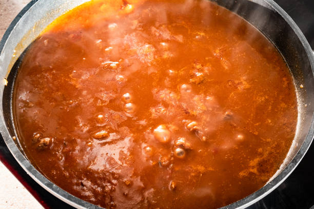 istock cooking goulash with beef, tomato and paprika 1349387149