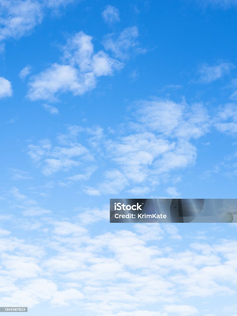 small light fluffy clouds in blue sky in autumn small light fluffy clouds in blue sky on sunny autumn day Sky Stock Photo