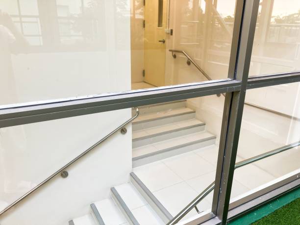 istock Glass room with stairs 1349390854