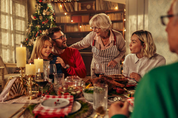 istock Three generations family gathering for christmas holiday 1349398203