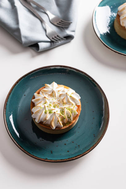 istock Lemon tart with meringue on a plate 1349399078