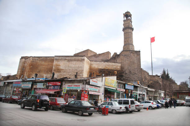 Traditional stores under Nigde Castle and watch tower stock photo