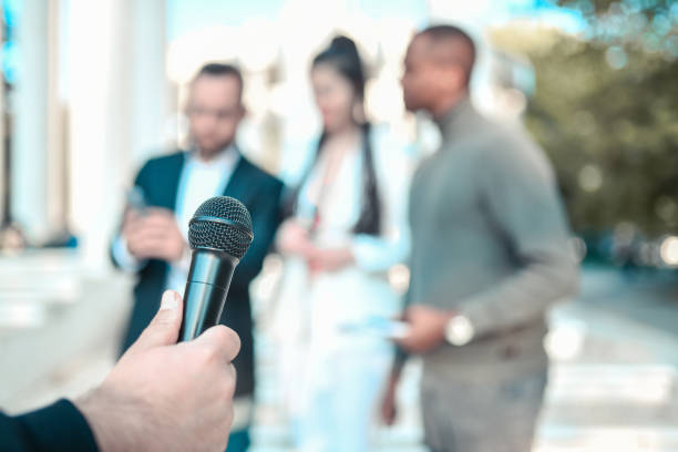 istock Journalist Holding Microphone And Preparing For Press Conference 1349403491