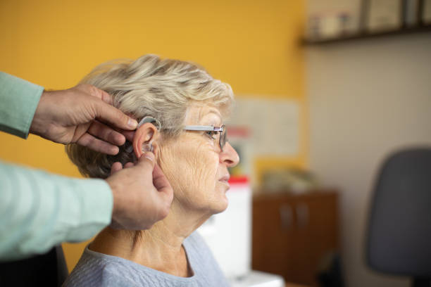 istock Hearing test and buying hearing aid 1349405692