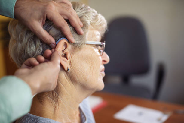 istock Hearing test and buying hearing aid 1349405829