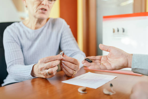 istock Hearing test and buying hearing aid 1349406495