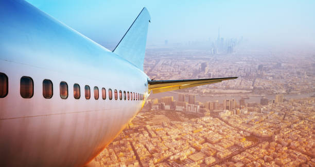 istock View of airplane tail take off from Dubai, UAE 1349410543
