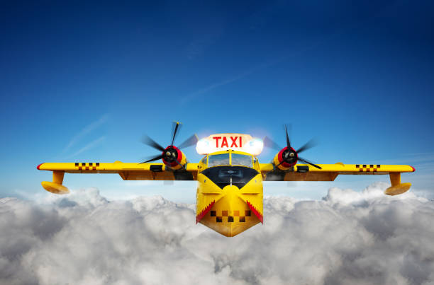 yellow air taxi airplane transportation in sky - color image people air vehicle airplane imagens e fotografias de stock