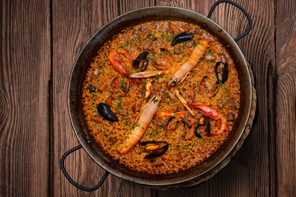 istock Seafood paella on rustic wood 1349412253