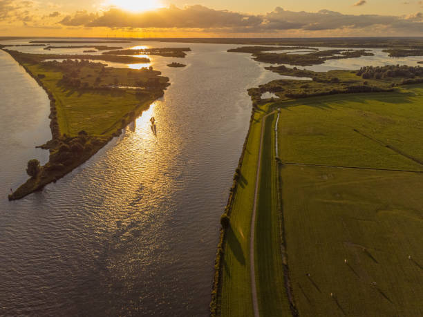 Aerial view of river IJsssel and Ketelmeer Aerial view of river IJsssel and Ketelmeer with small islands and wetlands in the late evening sun ijssel stock pictures, royalty-free photos & images