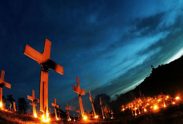 istock Crucifixis in a meadow to remeber wold war I 1349415488
