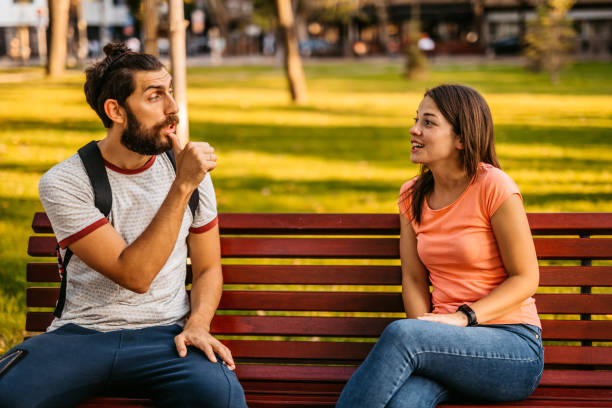 istock Young couple speak in sign language 1349416612