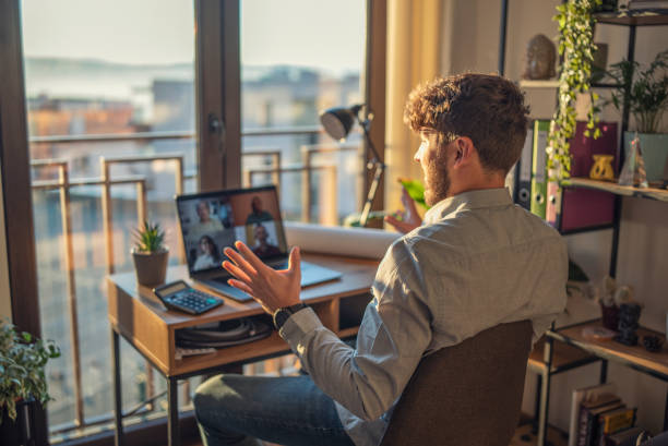 istock Businessman Having Video  Call In Home Office. 1349420996