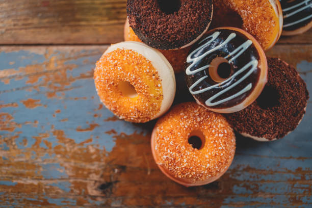 Donut For Breakfast On Wood Board